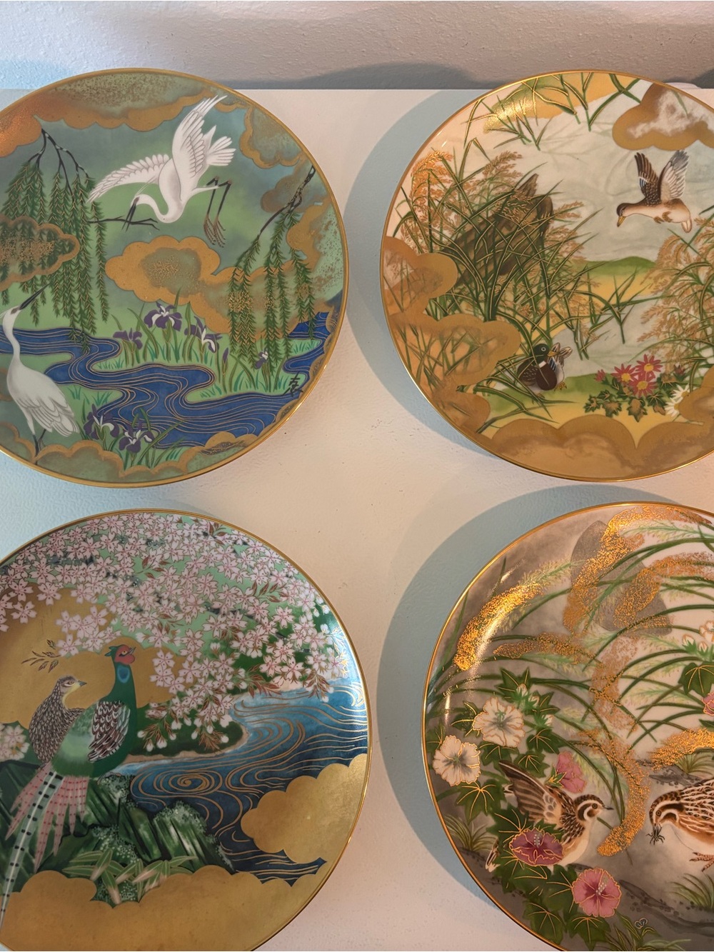 Set of Decorative Porcelain Dinnerware Plates with Green and Gold Bird Motifs